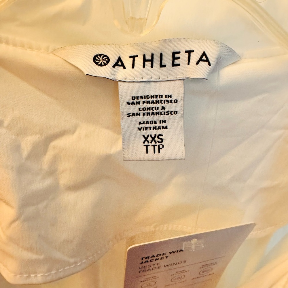 ATHLETA long, lightweight, white hooded windbreaker rain jacket. Elastic waist. - Picture 3 of 10